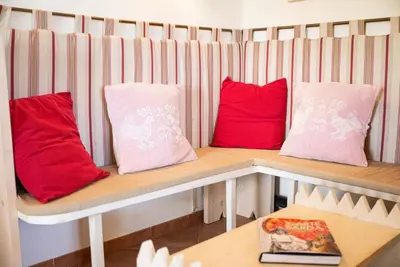 Area soggiorno di Lovely cottage with garden near Orosei