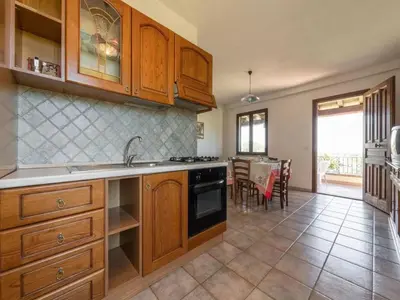 Cucina o angolo cottura di Holiday home near La Caletta beaches