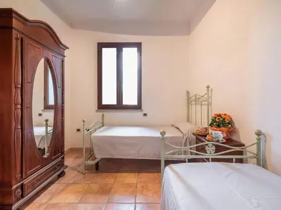 Letto o letti in una camera di Holiday retreat near La Caletta beaches