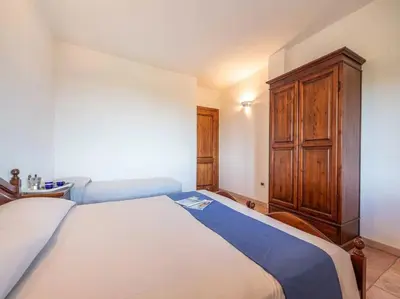 Letto o letti in una camera di Holiday retreat near La Caletta beaches