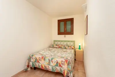 Letto o letti in una camera di Taverna Perla Marina 3