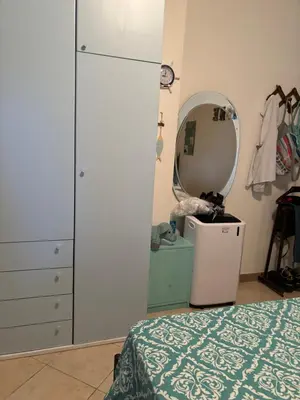 Letto o letti in una camera di Casa Azzurra