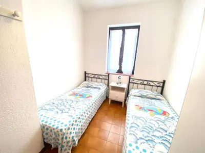 Letto o letti in una camera di Cinta 6