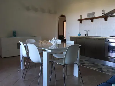 Cucina o angolo cottura di Bellavista San Teodoro appartamento vista mare