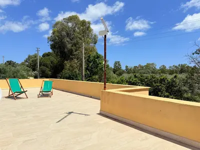 Balcone o terrazza di La Calabasa - Villetta a pochi passi dalla spiaggia di Sa Curcurica