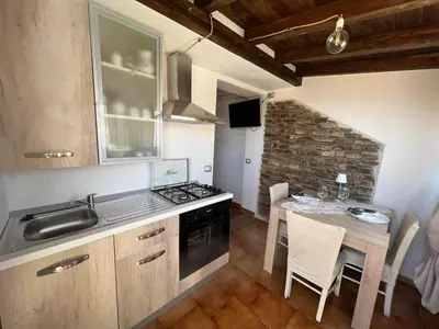 Cucina o angolo cottura di Massetti Rooms Alloggio per coppie sulla costa nord est dell isola a pochi passi dalla spiaggia