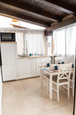 Cucina o angolo cottura di La Maison Tamerici