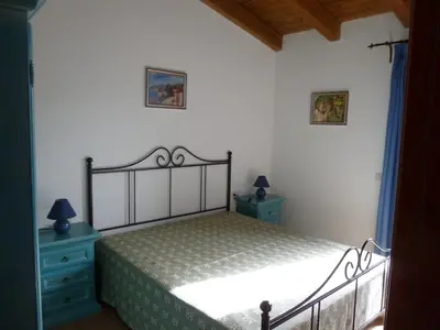 Letto o letti in una camera di Le Villette di San Teodoro