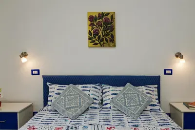 Letto o letti in una camera di Sole e Mare