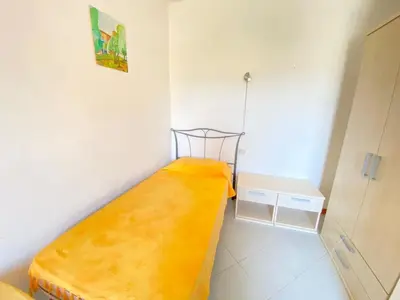 Letto o letti in una camera di Cinta 2
