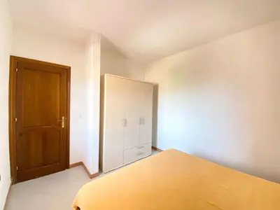 Letto o letti in una camera di Cinta 2