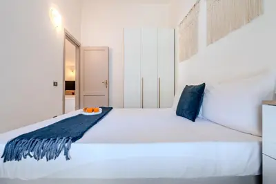Letto o letti in una camera di 5min dalla Spiaggia La Cinta - Villetta Elegante a San Teodoro