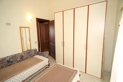 Letto o letti in una camera di Villino Paolo Malamuri