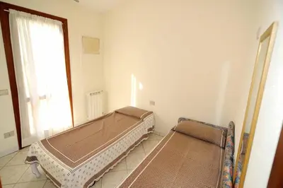 Letto o letti in una camera di Villino Paolo Malamuri