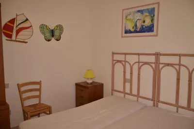 Letto o letti in una camera di Le Villette al Centro