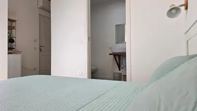 Letto o letti in una camera di Domo Ulleri