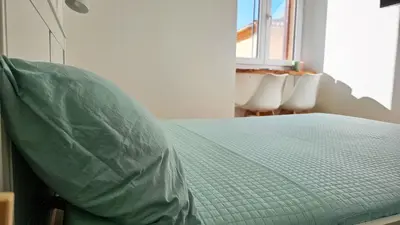 Letto o letti in una camera di Domo Ulleri
