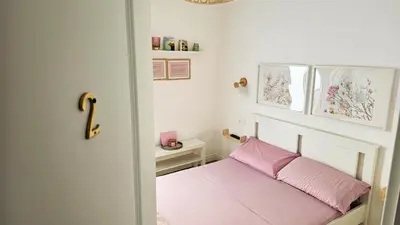 Letto o letti in una camera di Domo Ulleri