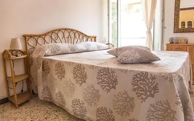 Letto o letti in una camera di Casa Baia Chiara - Cala Gonone