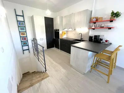 Cucina o angolo cottura di Casa Soliana ampio appartamento per 6 Fiber & WiFi