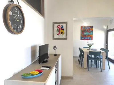 TV o dispositivi per l'intrattenimento presso Casa Soliana ampio appartamento per 6 Fiber & WiFi