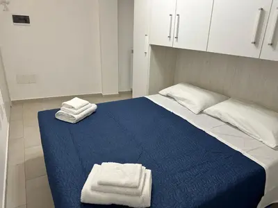 Letto o letti in una camera di Beautiful Apartment with Swimming Pool