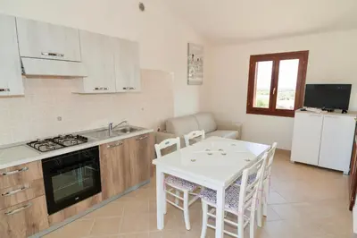 Cucina o angolo cottura di Residence in Malamurì near Budoni, apartments 4 beds with private outdoor area
