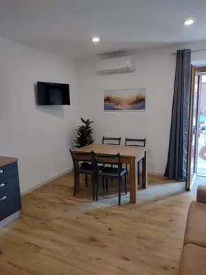 TV o dispositivi per l'intrattenimento presso Iside Accommodations