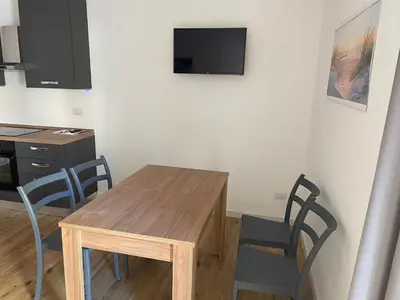 TV o dispositivi per l'intrattenimento presso Iside Accommodations