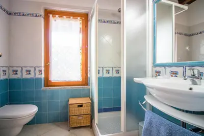 Bagno di GuestHost - Sea view APT, pool & parking!
