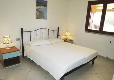 Letto o letti in una camera di Le Maree I Giacinti