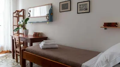 Letto o letti in una camera di La casa delle conchiglie IUN P2313