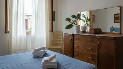 Letto o letti in una camera di La casa delle conchiglie IUN P2313