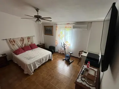 TV o dispositivi per l'intrattenimento presso Two bedrooms apartment in Orosei