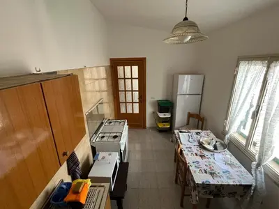 Cucina o angolo cottura di Two bedrooms apartment in Orosei