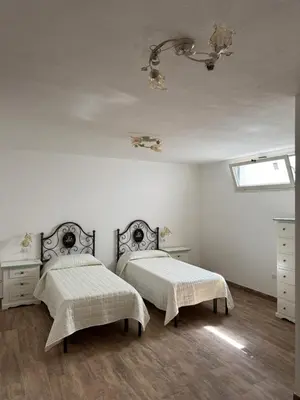 Letto o letti in una camera di Budoni residence Lutturai 3