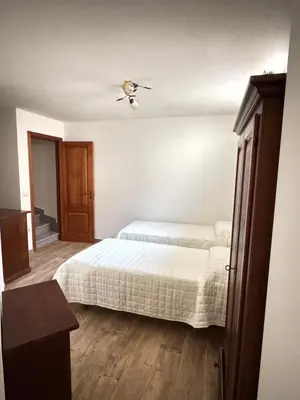 Letto o letti in una camera di Budoni residence Lutturai 4