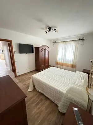 Letto o letti in una camera di Budoni residence Lutturai 4