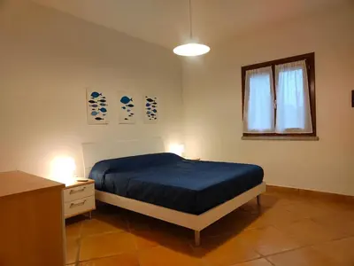 Letto o letti in una camera di Apartment with garden