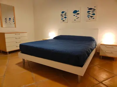 Letto o letti in una camera di Apartment with garden