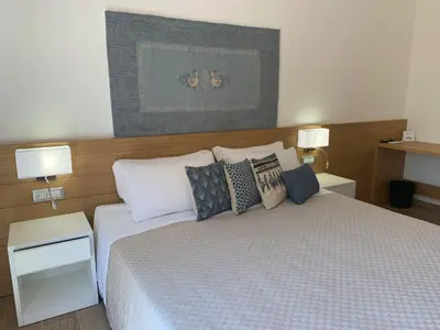 Letto o letti in una camera di Domo Grace