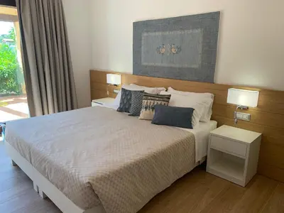 Letto o letti in una camera di Domo Grace