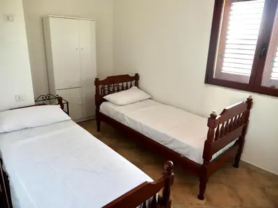 Letto o letti in una camera di Appartamento Estate
