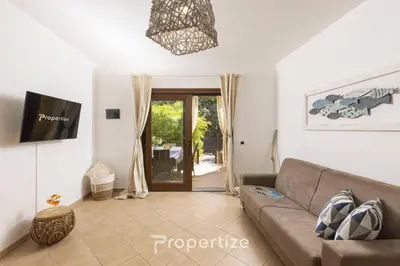 TV o dispositivi per l'intrattenimento presso Villetta con idromassaggio e patio by Propertize