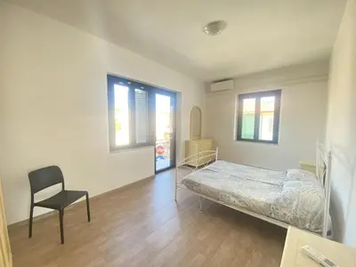 Letto o letti in una camera di Casa Passeri