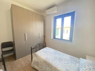 Letto o letti in una camera di Casa Passeri