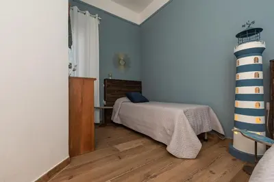 Letto o letti in una camera di Appartamento Confortevole nel cuore del centro storico