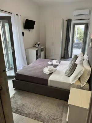 Letto o letti in una camera di Affittacamere Mary's Rooms
