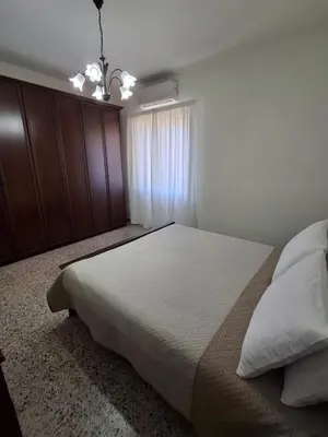 Letto o letti in una camera di Appartamento Olbia