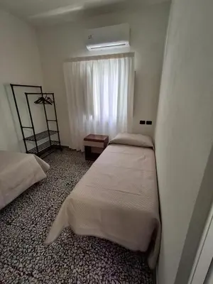 Letto o letti in una camera di Appartamento Olbia